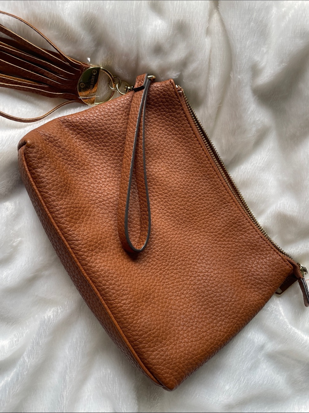 Steve Madden Brown wristlet with Tassel